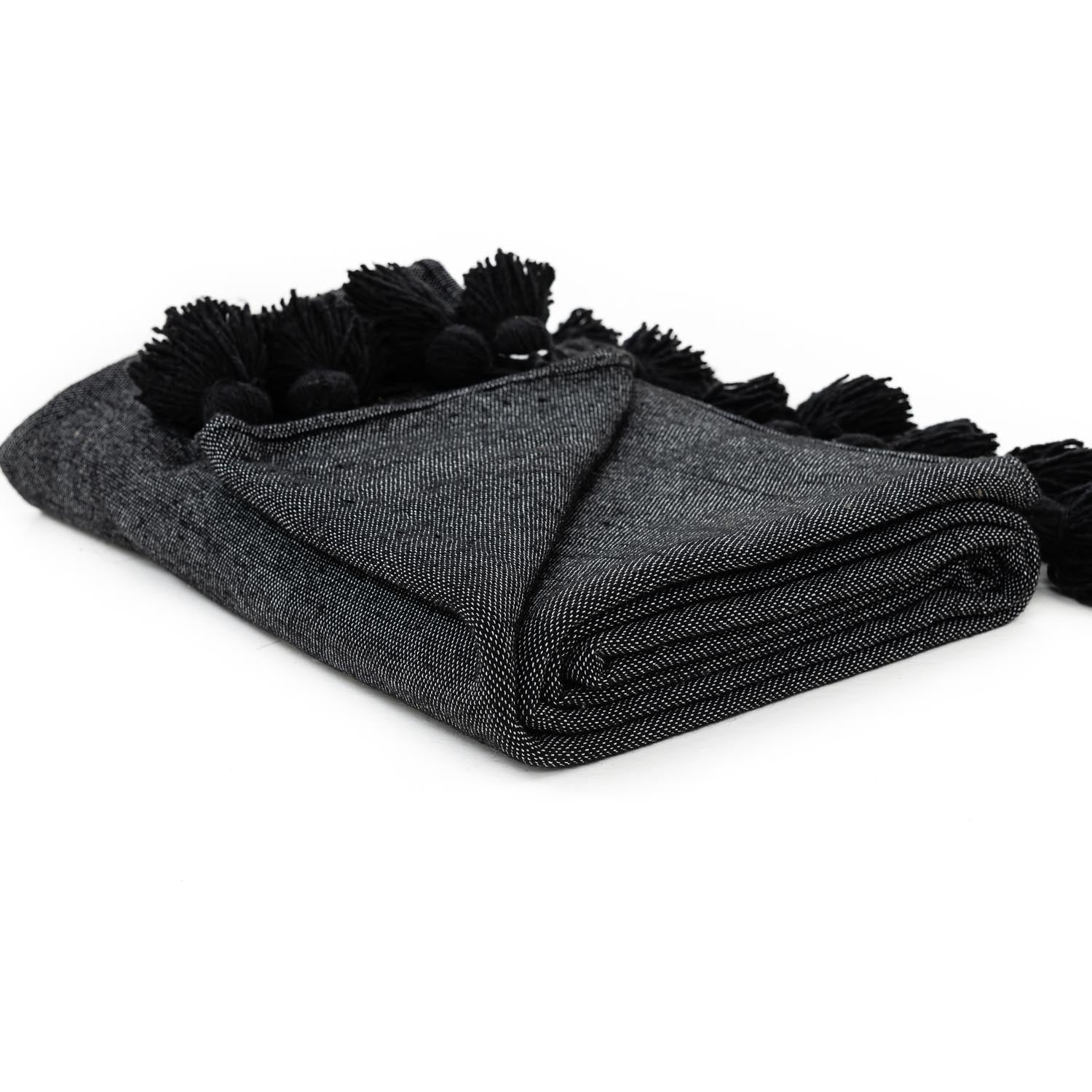 Plaid en laine à pompons noir fait main